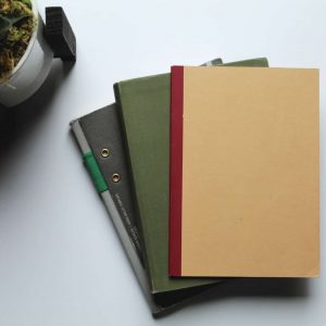 brown folder on white table